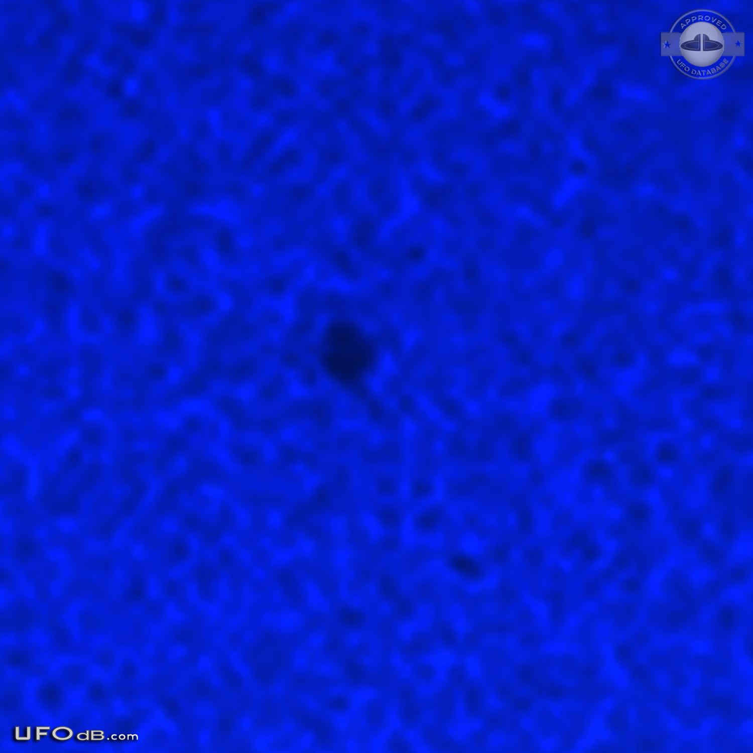 Donut Shaped UFO in blue sky over Blackburn North, Australia in 2012 UFO Picture #575-4